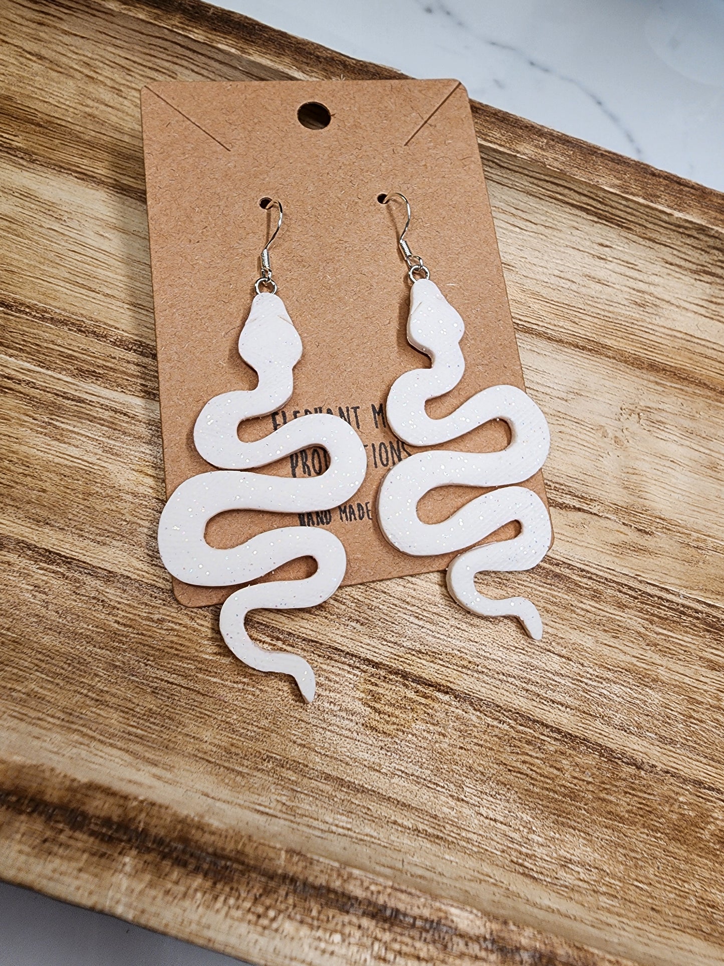 White Shimmery Snake Earrings